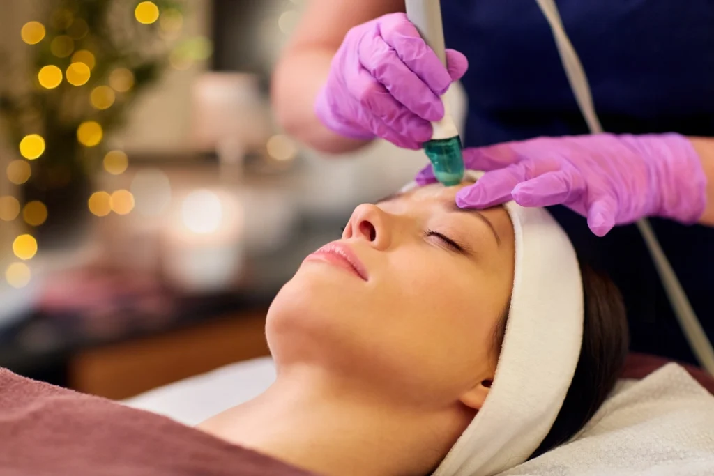 woman-having-microdermabrasion-facial-treatment